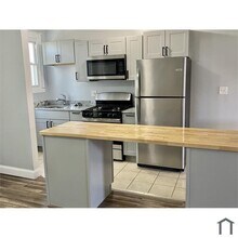 Building Photo - 3 Bedroom Plus Den