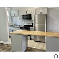 Building Photo - 3 Bedroom Plus Den