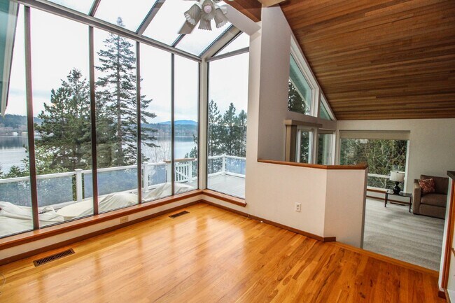 Building Photo - Spacious 4-Bedroom Home with Stunning Lake...