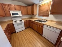 Building Photo - Rare 4BD/2BA Duplex Coming Available in No...