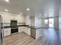 Building Photo - Modern 2BD Fremont Condo – EV Charger, Balcony, & Walk to BART