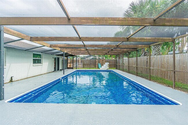 Building Photo - 6321 Spanish Main Dr