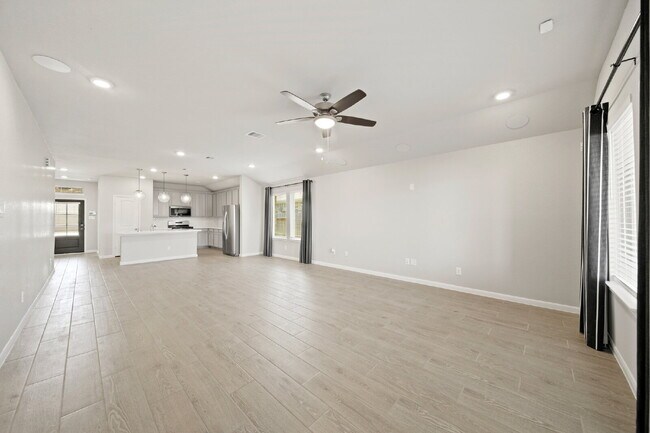 Building Photo - "Charming 4-Bed Sanctuary on Gentle Breeze Lane - Spacious 1861 Sq. Ft. Home with 2 Full Baths in...