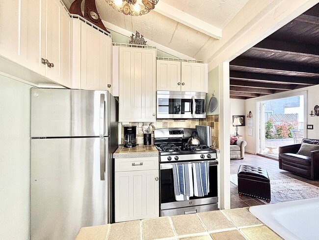 Building Photo - 1205O | Spanish Beach Bungalow Retreat | M...