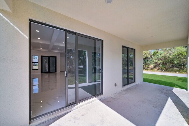 Building Photo - Be the first in occupy this 2026 constructed home in the city of Port Charlotte FL! Qualify for a...