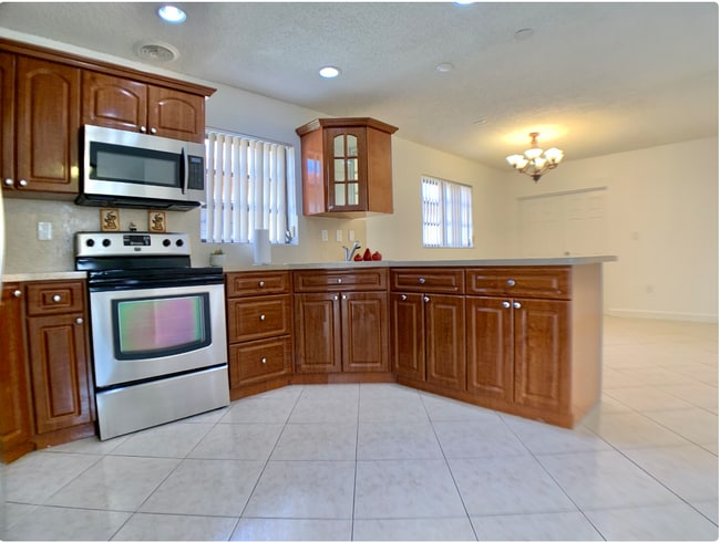 Building Photo - 6411 W 22nd Ct