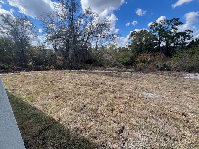 Building Photo - Brand-New 3BR/2BA Home with Garage – Serene Lake Placid Neighborhood