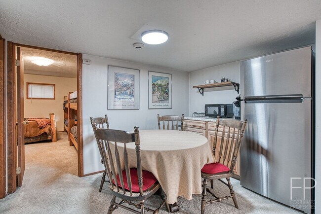 Building Photo - On the Blue River!  HUGE 4 Bedroom home, Furnished Updates throughout!  Bus route!  Spacious parking