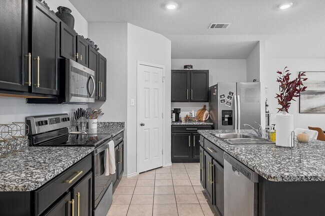 Building Photo - 9705 Kensley Rose Dr
