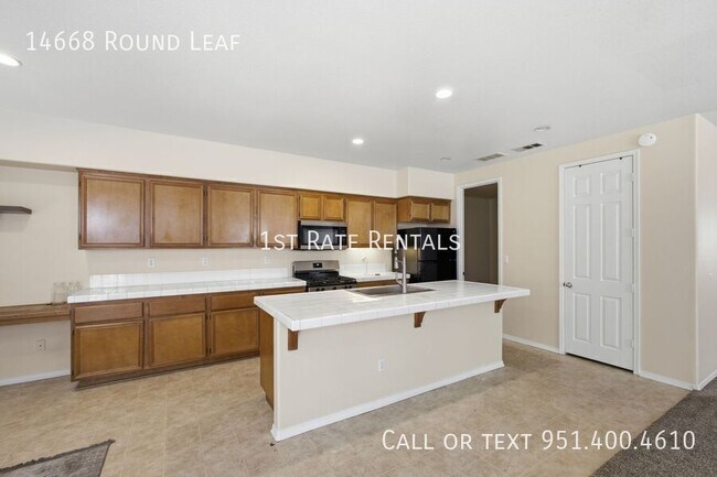 Building Photo - 14668 Round Leaf Rd