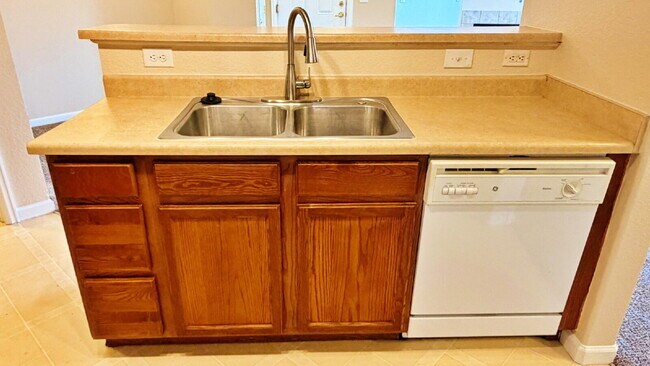 Building Photo - NEW CARPET NEW PAINT!! Clean and Bright 2BR 2BTH Condo Close To DIA. Gated Community in First Cre...