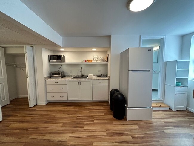 Building Photo - West AVL - Furnished Basement Studio Apart...