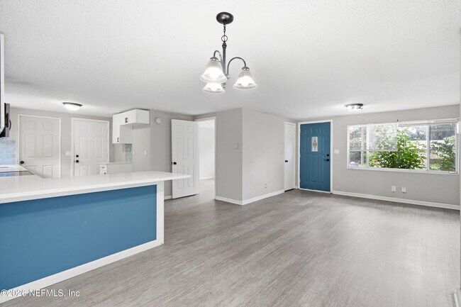 Building Photo - 7386 Dostie Dr E