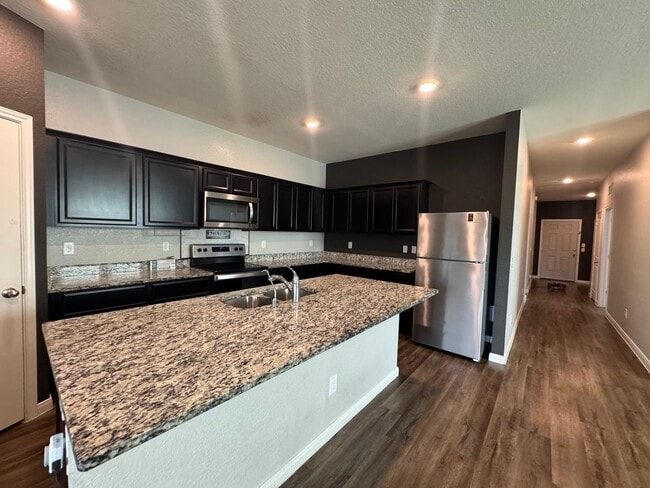 Building Photo - Spacious 4 Bedroom 3 Full Bath home in the Liberte Community!