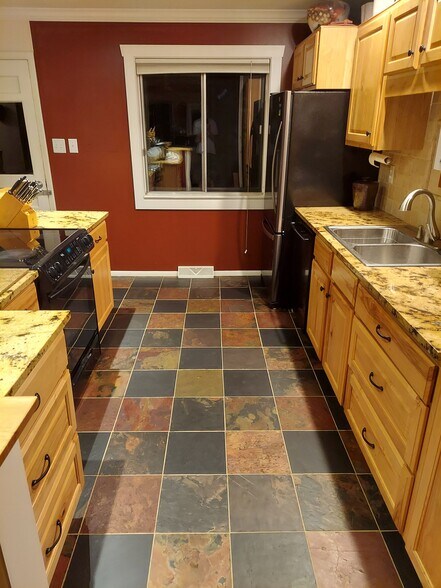 kitchen floor - 11175 W Ohio Dr