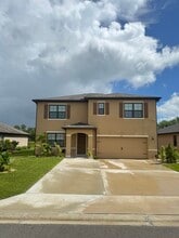 Building Photo - 6455 NW Castlebrook Ave