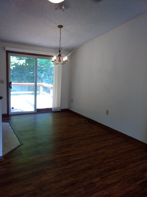 Dining room w/slider leading to deck - 314 Lake Crystalbrook Dr