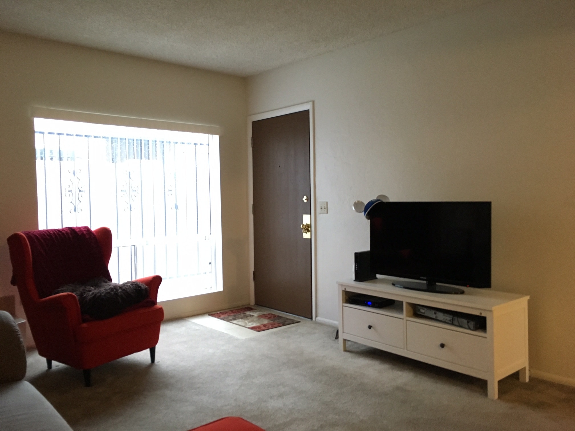 Living room with example furnishings (not provided) - 702 E Linden St