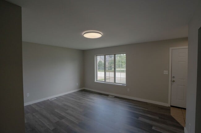 Building Photo - Must see FOUR bedroom Trilevel home