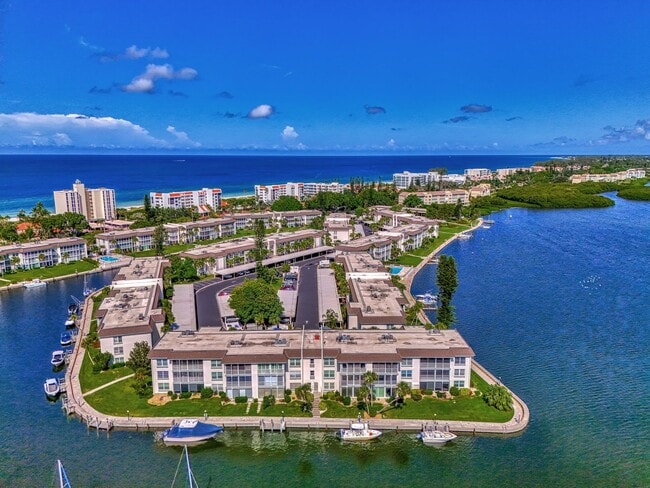 Building Photo - LUXURY LONGBOAT LIVING AT IT’S FINEST! AVA...