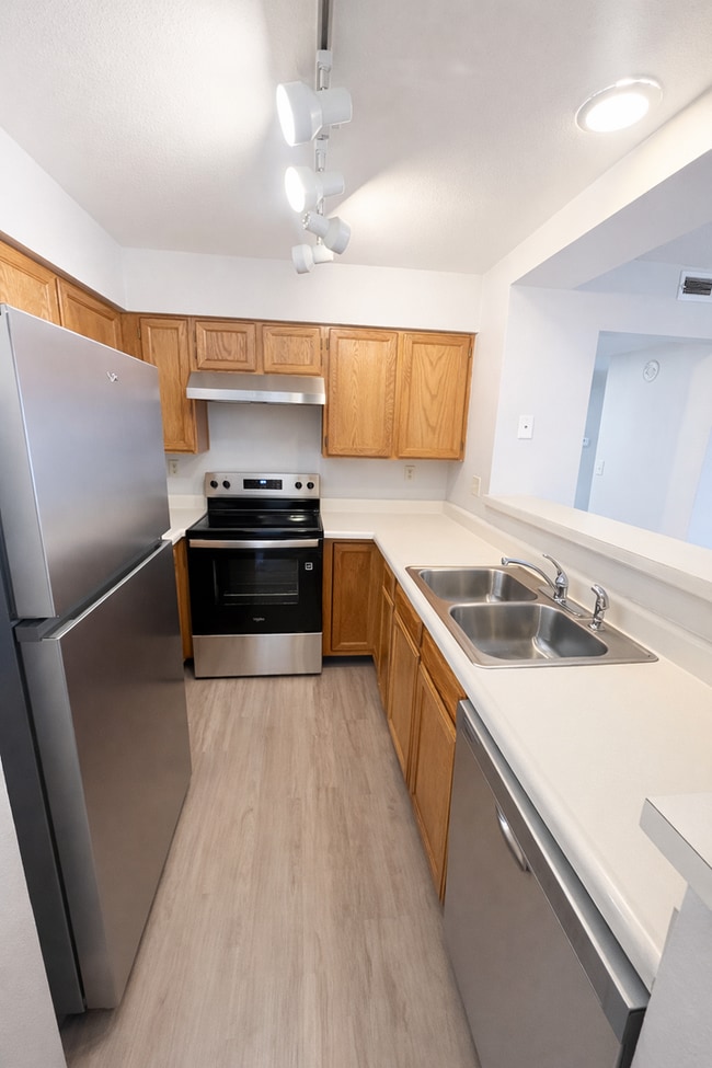 Building Photo - Charming 2 Bedroom Second Story Condo with easy access to everything!