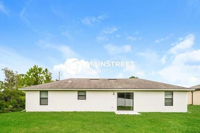 Building Photo - 4 Bedroom Pet-Friendly Home in Lehigh Acres, FL with Main Street Renewal