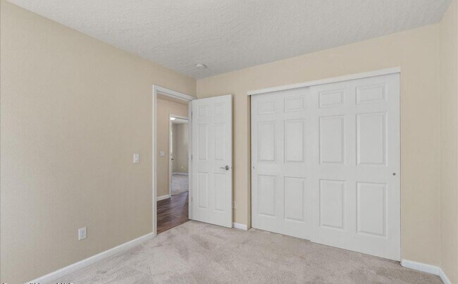 Building Photo - 4995 N Tasman Dr