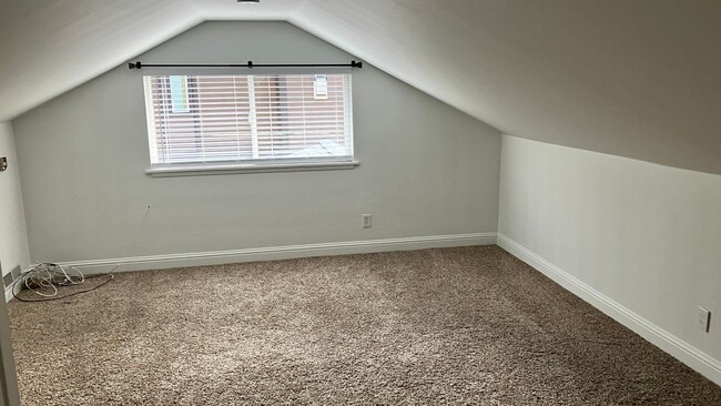 Building Photo - Long term rental with garage and large bac...