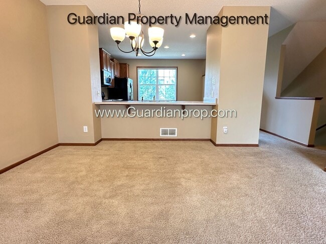 Building Photo - Pet Free Champlin Town Home, 3.5 Baths, 2 Car Garage, Dishwasher, Balcony, Available end of April