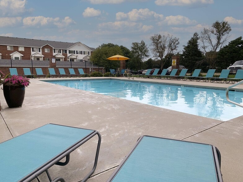 Soak up the sun or take a dipyour resort-style pool and sundeck make every day feel like a getaway. - Ridge Pointe Villas