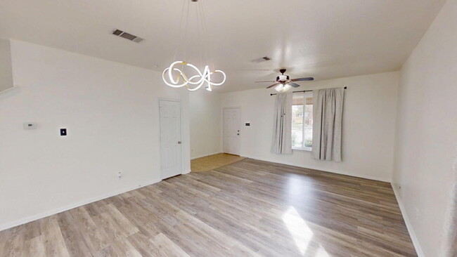 Building Photo - Expansive Living and Stylish Updates in So...