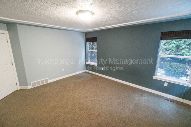 Building Photo - 6415 S Woodland Ct