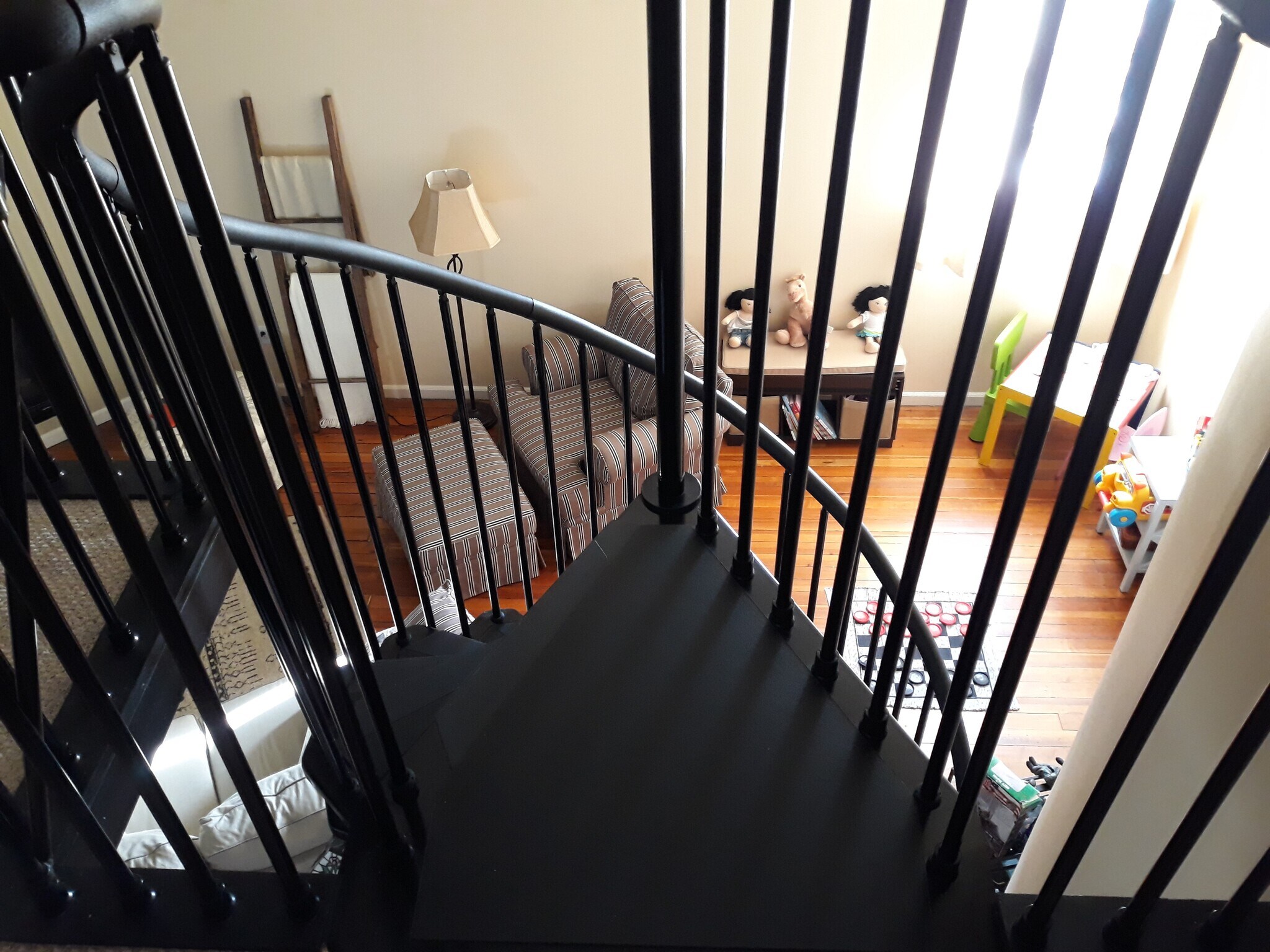 Master bedroom looking down from mezzanine - 208 East Main Street