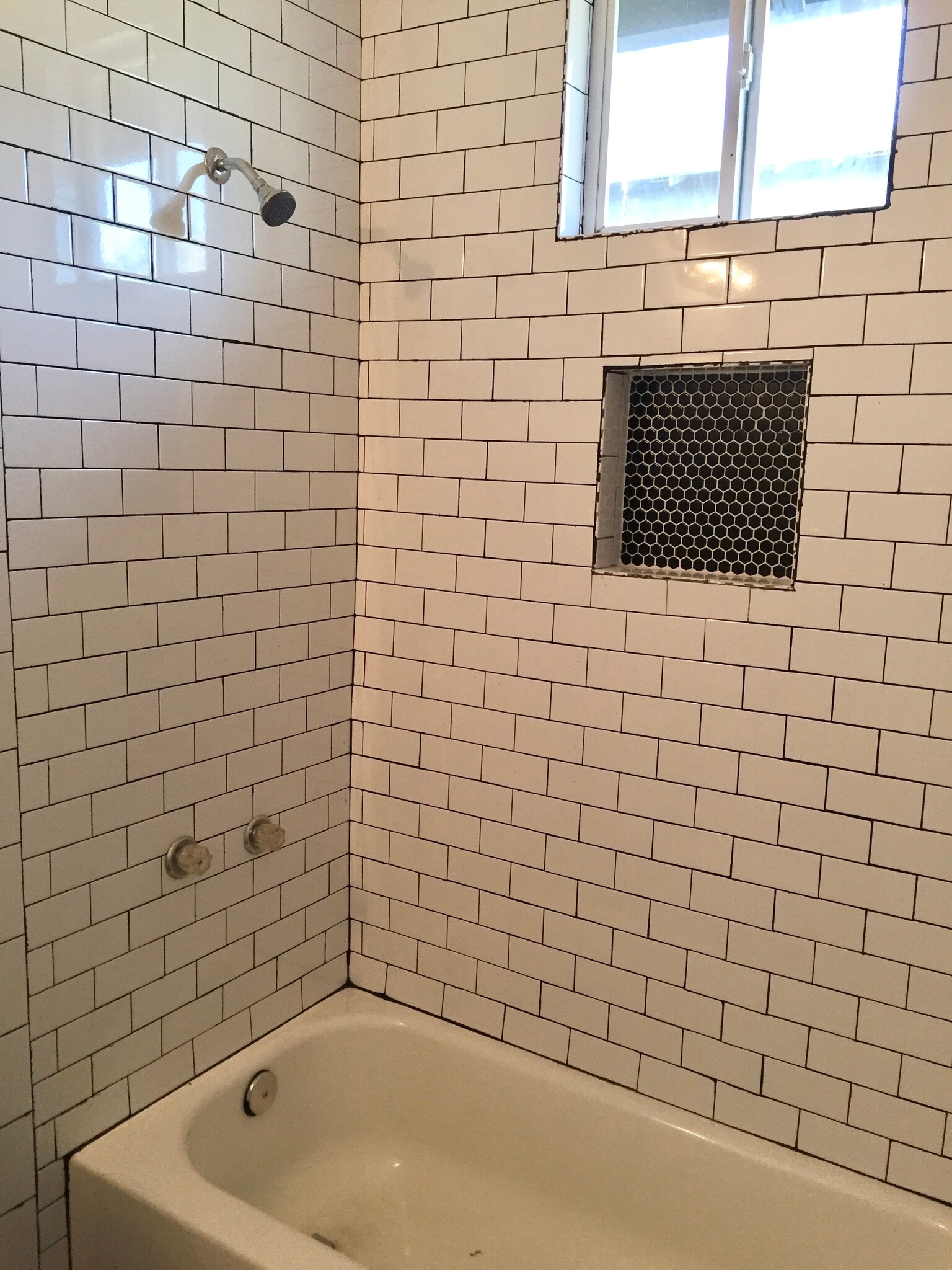 Shower with subway tile - 1131 W Lynwood Ave