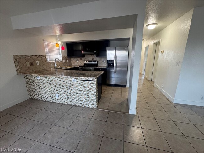 Building Photo - 6233 Ilanos Ln