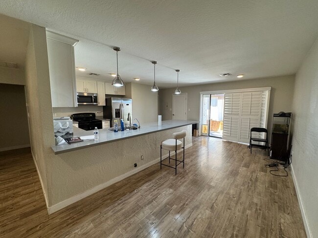 Building Photo - 4 bedroom basement home North Mesa