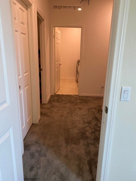 hallway to kitchennet and laundry room - 7893 Boot Straps Ct