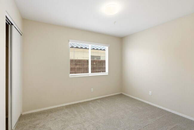 Building Photo - 4 bedroom with NO HOA! New Appliances & New Carpet!