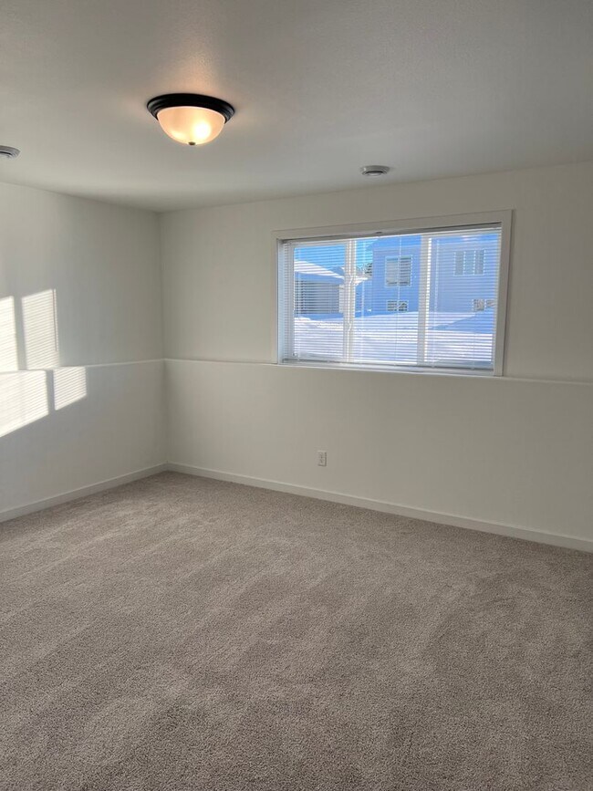 Building Photo - New 3 Bedroom/3 Bathroom House