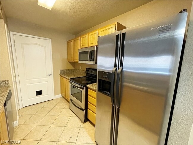 Building Photo - 5055 W Hacienda Ave