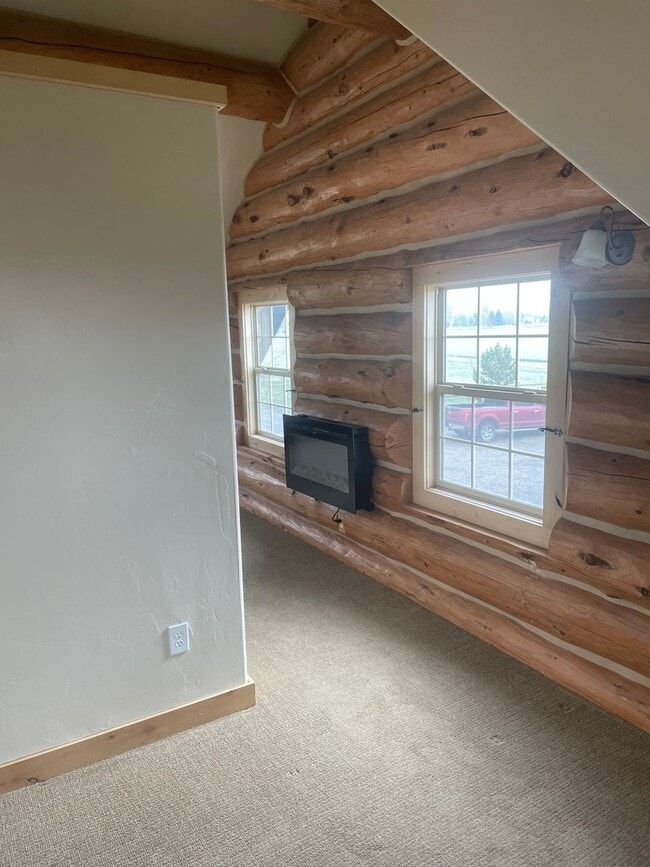 Building Photo - Charming Log Home For Rent with Large Shop & Spacious Yard