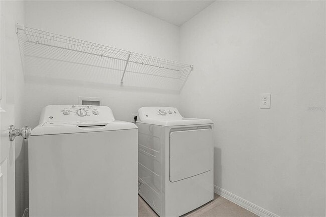 Building Photo - 5767 Purple Finch Ave