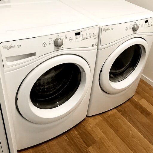 Spacious In-house Laundry Room with Linen Storage - 3425 2nd Ave