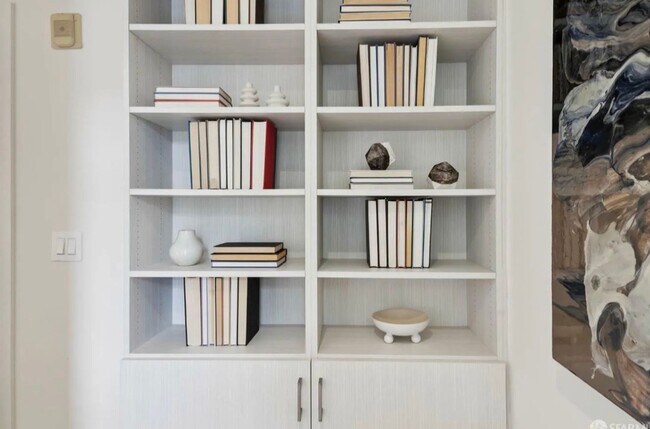 Building Photo - One-of-a-Kind Sophisticated Top-Floor Cond...