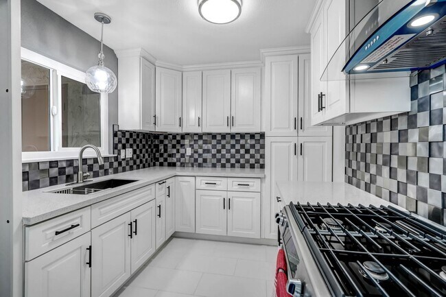 Building Photo - Coming Soon! Turn-key and Move-in Ready 2 Bedroom, 1.5 Bath Two-Story Corner-Lot Townhouse!