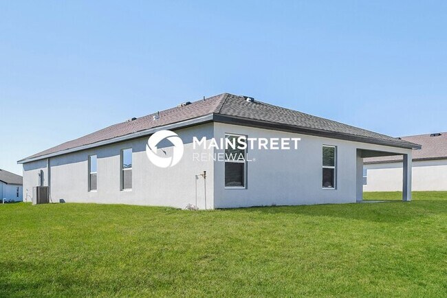 Building Photo - 4 Bedroom Pet-Friendly Home in Mascotte, FL with Main Street Renewal