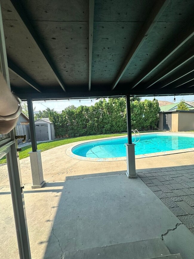 Building Photo - Charming 3-Bedroom, 1.5-Bath Home with Pool & Outdoor Entertaining Oasis