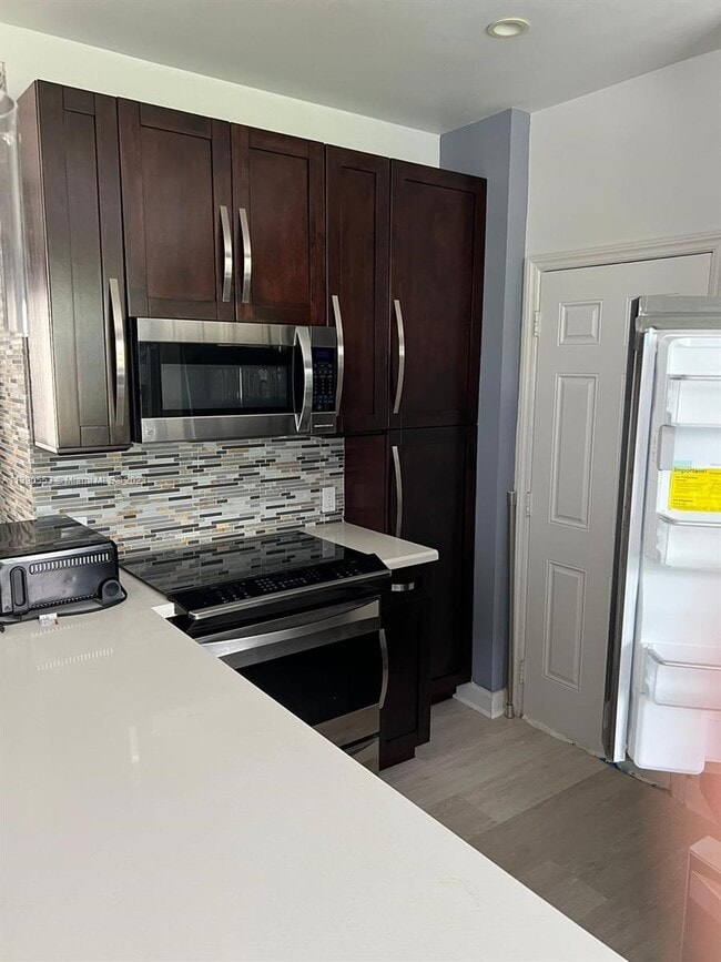 Building Photo - 9910 Collins Ave