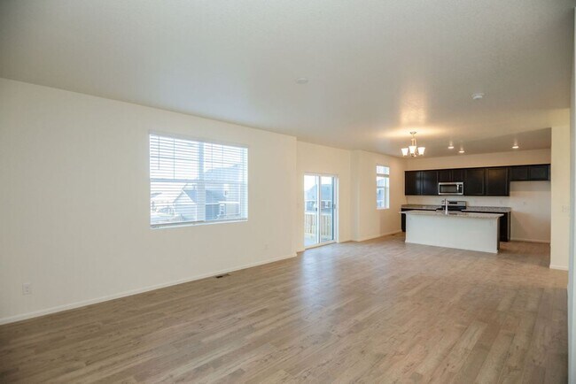 Building Photo - Spacious 4-Bedroom Home  + Office + Loft  with 3-Car Garage, Walk-Out Basement & Community Pool| ...
