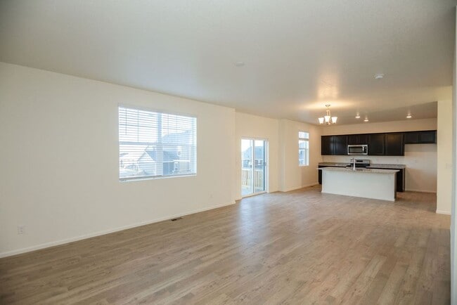 Building Photo - Spacious 4-Bedroom Home with 3-Car Garage & Walk-Out Basement | Prime Living Opportunity